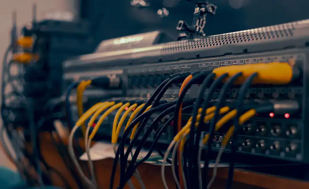 Professional connecting audio cables on a stream deck